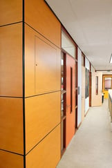 School hallway using Fundermax's durable phenolic panels