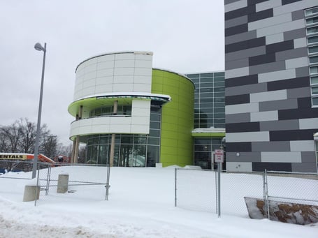 Goodwin College, Technology & Design Building curved design  from the side with Fundermax