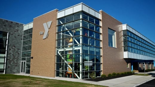 YMCA building in New York using Fundermax exterior panels and Scaleo Lap Siding fastening system.