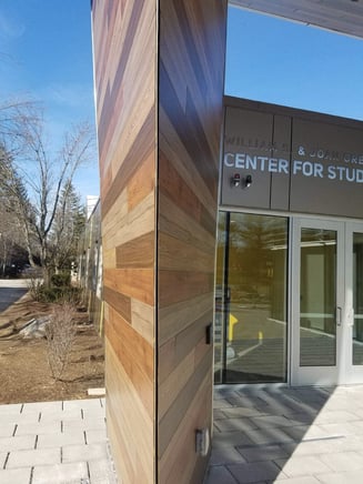 Close up of the flawless design of the South New Hampshire University library using exterior panels and a Fundermax Modulo fastening system.