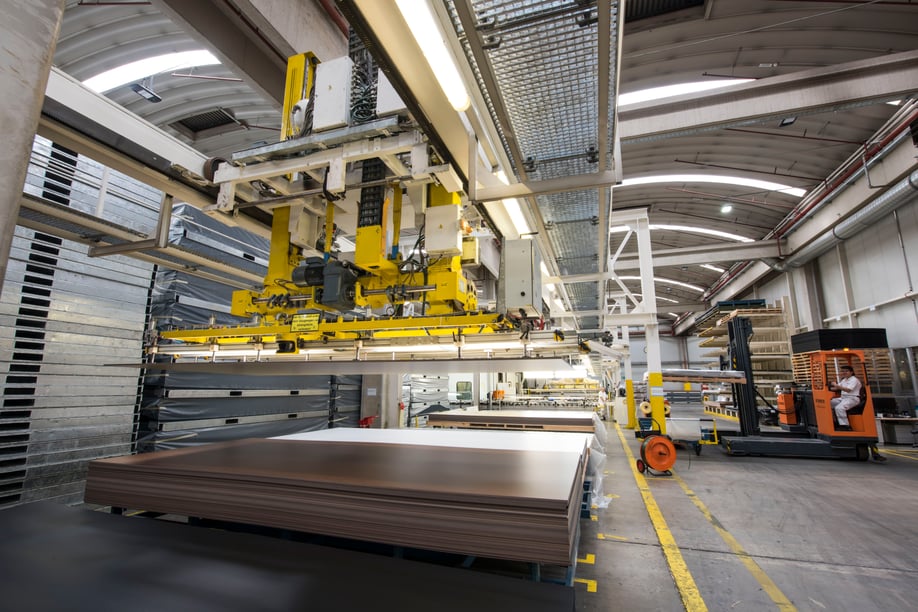 Fundermax's machinery working to create high pressure laminate panels