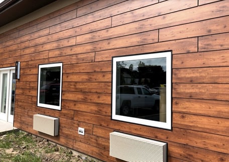 Example of how natural HPL woodgrain panels can look on the exterior