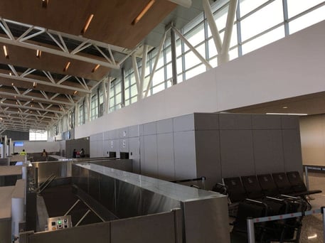 Airport of Calgary in Calgary, Canada; Fundermax Max Compact Interior in Aluminum #1300, White #0085, Dark AF #0160; finishes FH, NT