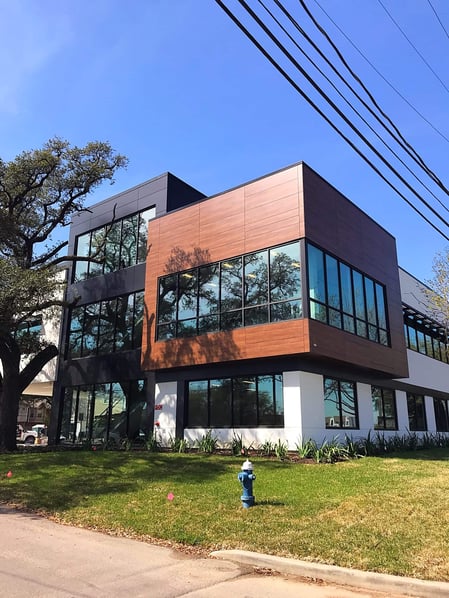 EDIFIS Group office building project with a woodgrain Fundermax panel