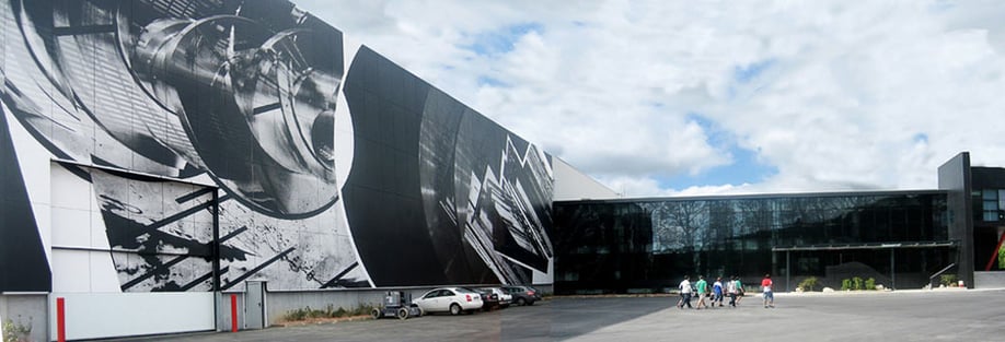 Indar Electric Company's large digitally printed phenolic panels from Fundermax on the exterior of their office building