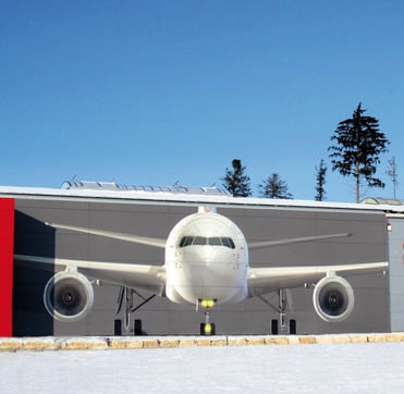 Custom digitally printed airplane image on the side of a wall