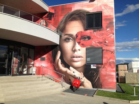 Custom digitally printed HPL panel in Spain on the exterior of an office building