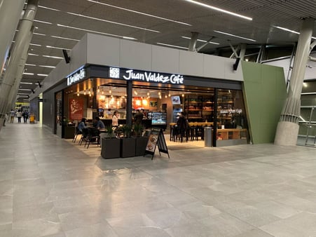 Examples of High-Traffic Spaces Where HPL Cladding Thrives - Airport Food Court