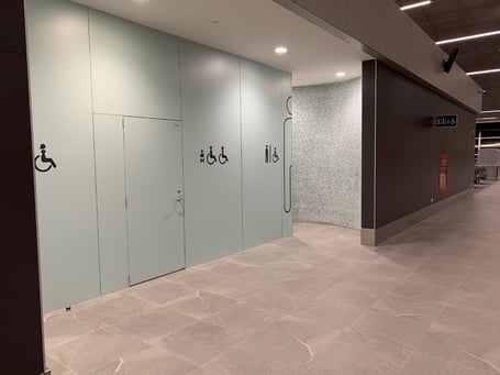example of Fundermax's Max Compact Interior Plus phenolic panels in a washroom