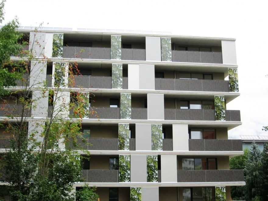 Exterior wall panels used as balconies to disguise a building with nature creatively